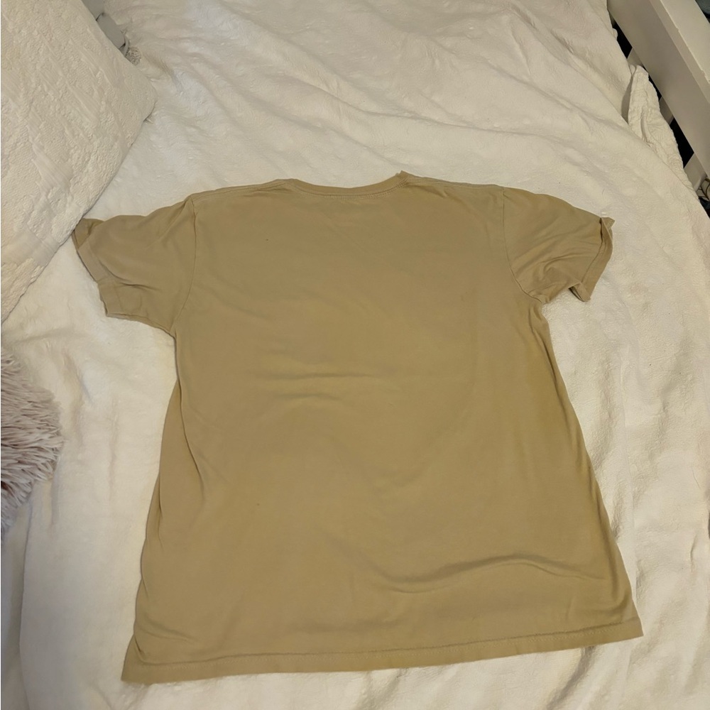 No tag. Tan t shirt. Women’s. Guitar. Dogs.